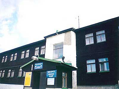 Povrchová úprava dřevěného pláště budovy